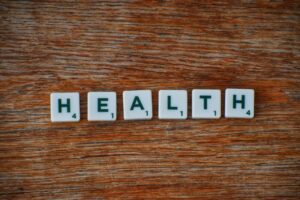 Image of tiles spelling health for the article why people come to see us